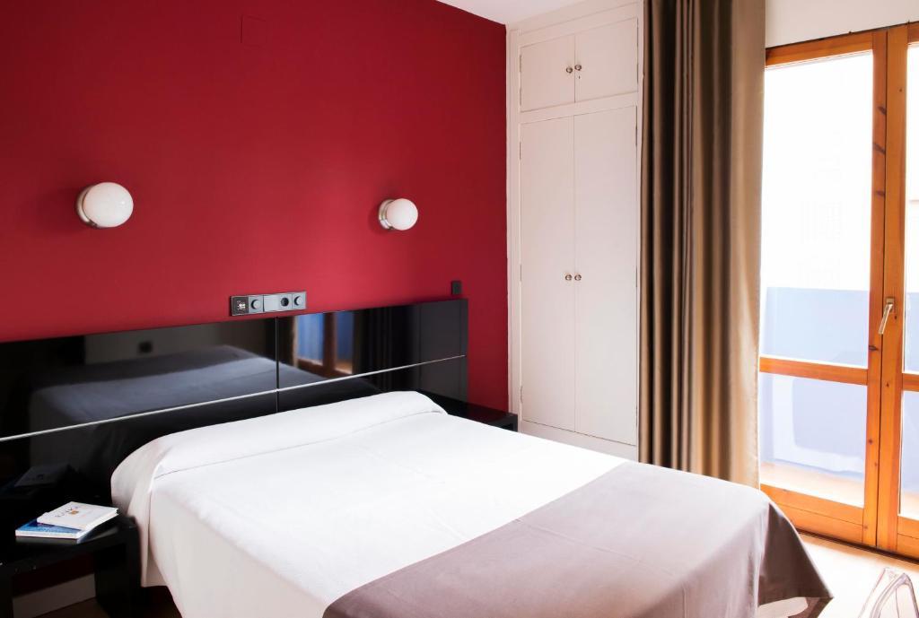 Hospedium Hostal Un Punto Chic Huesca Bagian luar foto
